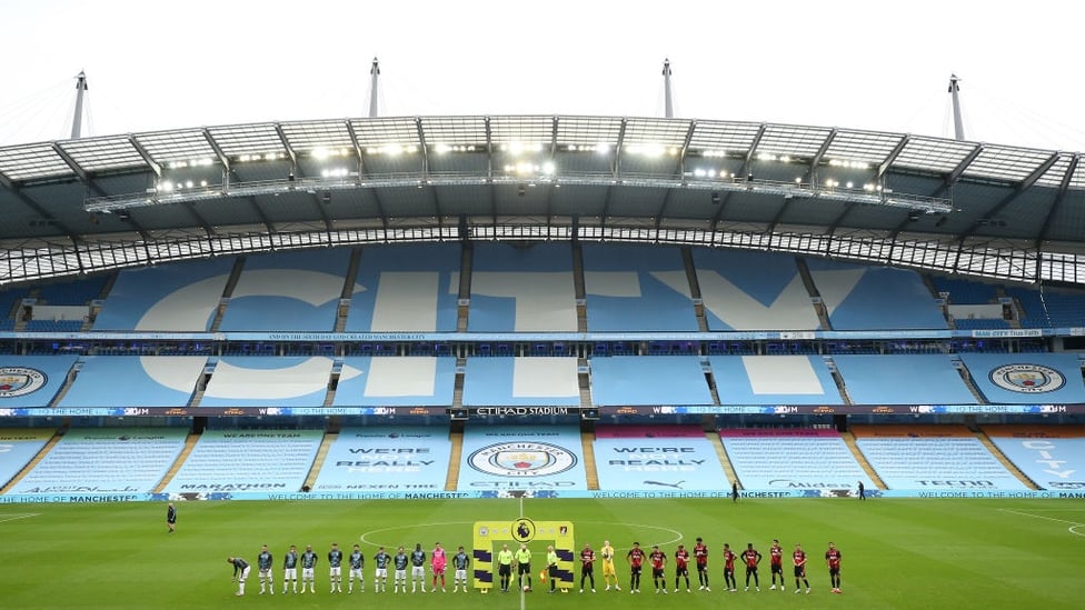 READY TO GO : The players emerge onto the pitch as kick-off approaches.