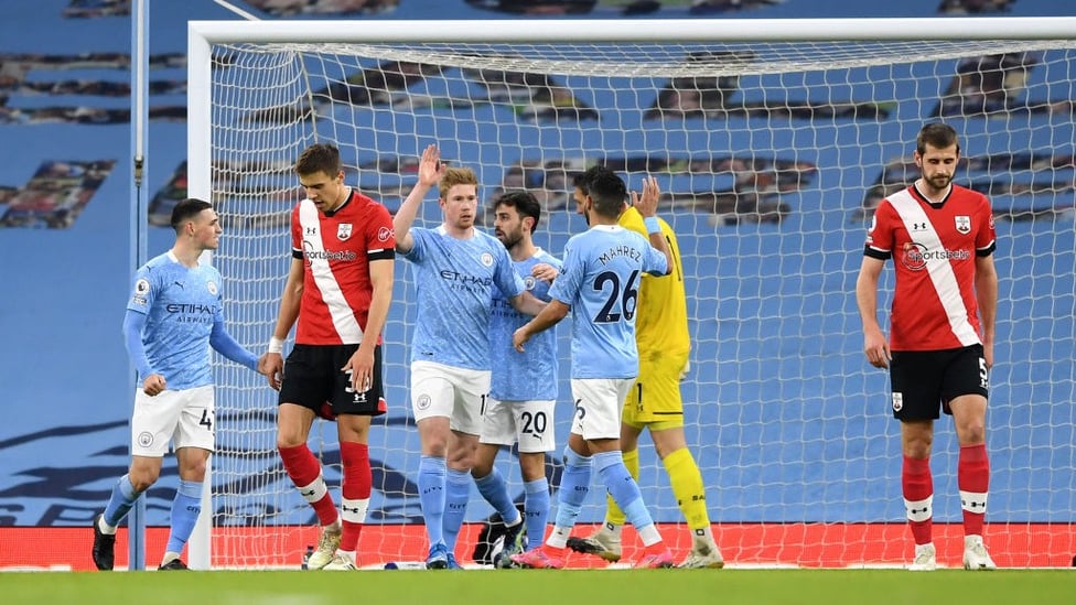 SQUAD GOALS: The lads celebrate De Bruyne's opener