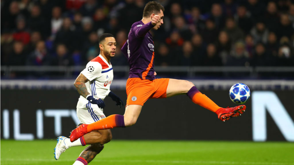 AT FULL STRETCH : Aymeric Laporte clears from Memphis Depay