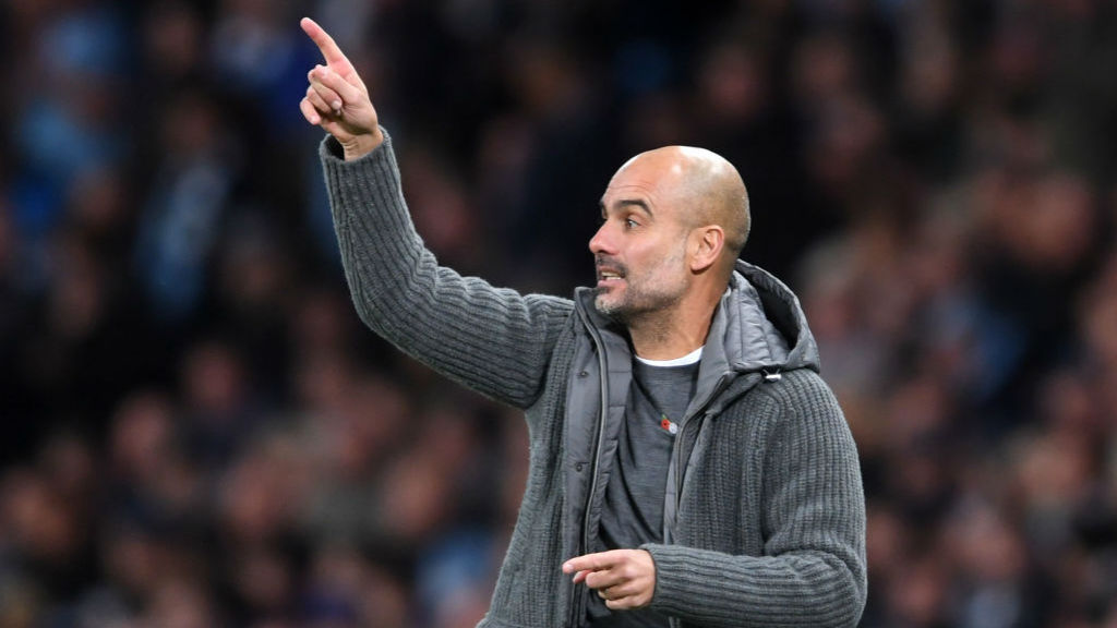 PEP'S POINTER : City boss Pep Guardiola urges the Blues on