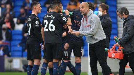 PEP TALK: Guardiola passes on some instructions after the red card.