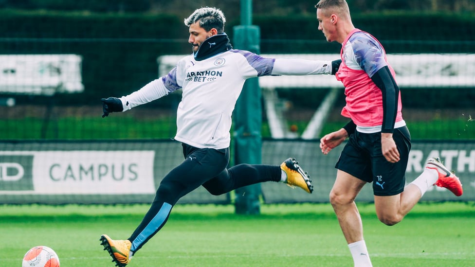 TAKING AIM : Sergio Aguero doing what he does best.