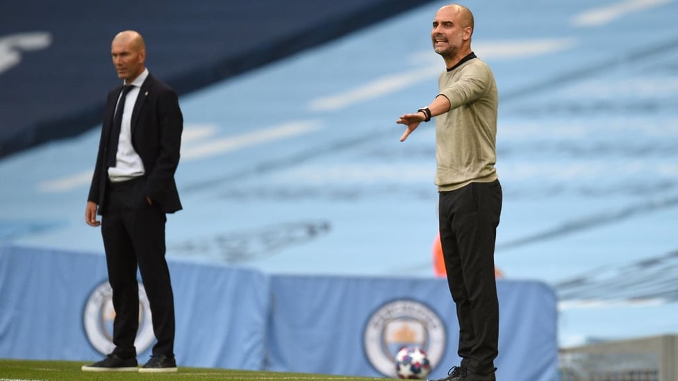 THE MANAGERS: Pep dishes out instructions from the touchline