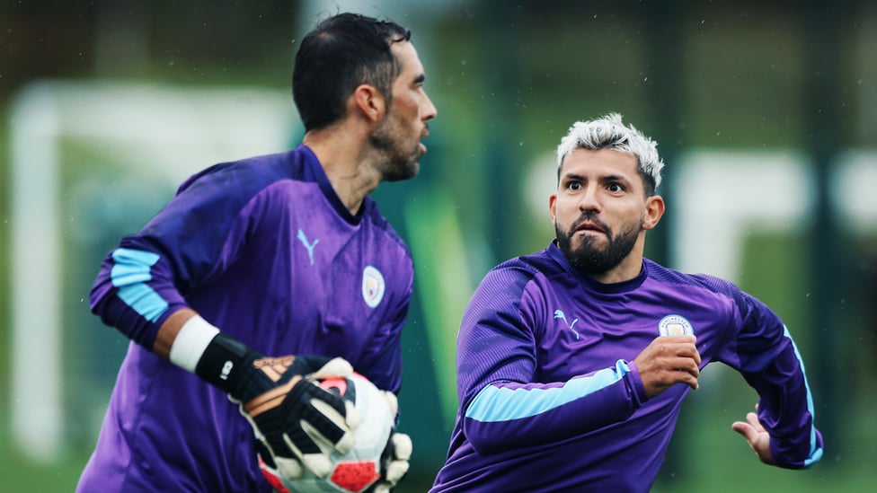 UNDER PRESSURE : Sergio Aguero gets up close and personal with Claudio Bravo