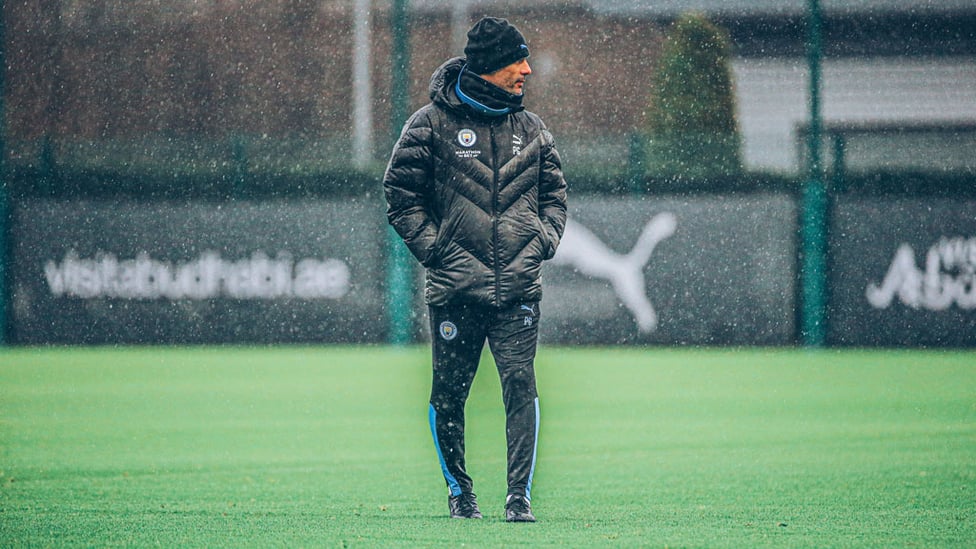 ONE PEP AT A TIME : The boss looks on at a rainy CFA