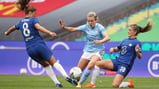 BATTLE: Hemp attempts to weave her way beyond two Chelsea players early on.