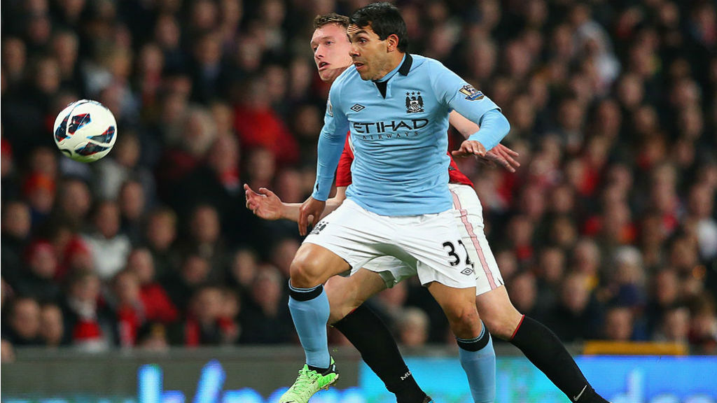 CROSSTOWN TRAFFIC : Carlos Tevez tasted silverware with both United and City