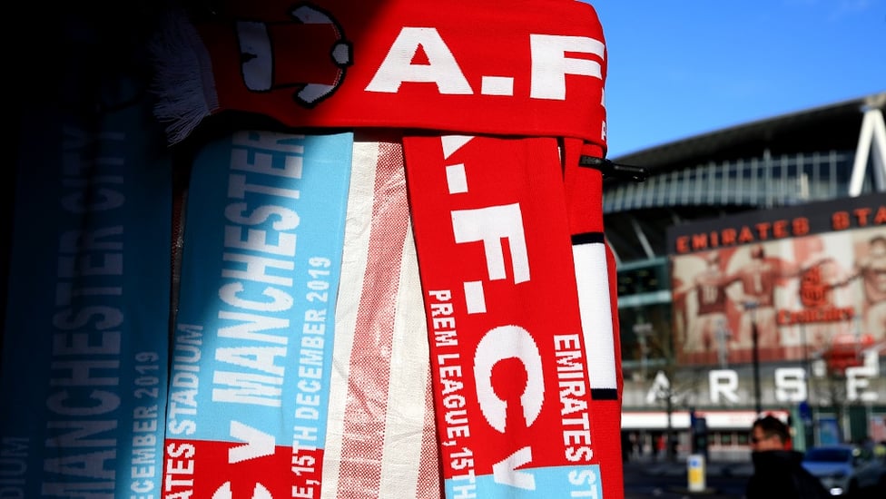 COLOURS : City/Arsenal scarves on sale outside the stadium