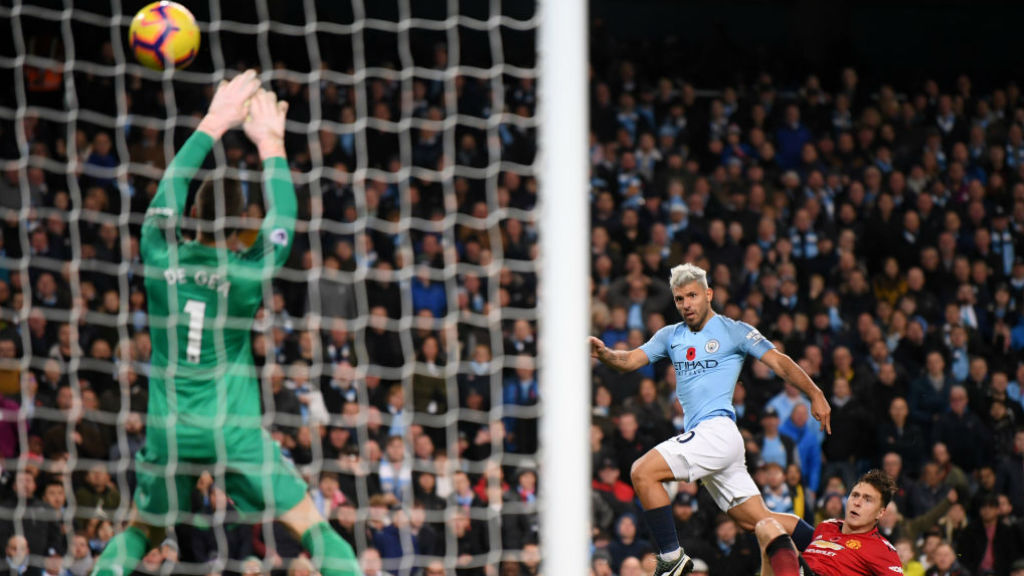 JUST TWO GOOD : Sergio Aguero slams home City's second goal with a thunderous strike