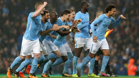 WINNING TEAM: City players celebrate the shoot-out victory
