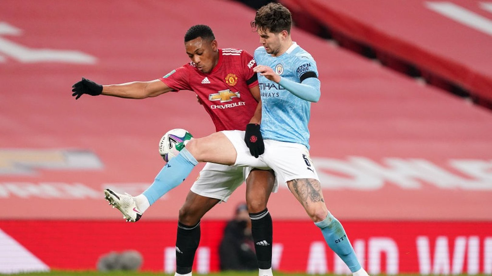 SOLID STONES: John Stones gets the better of Anthony Martial