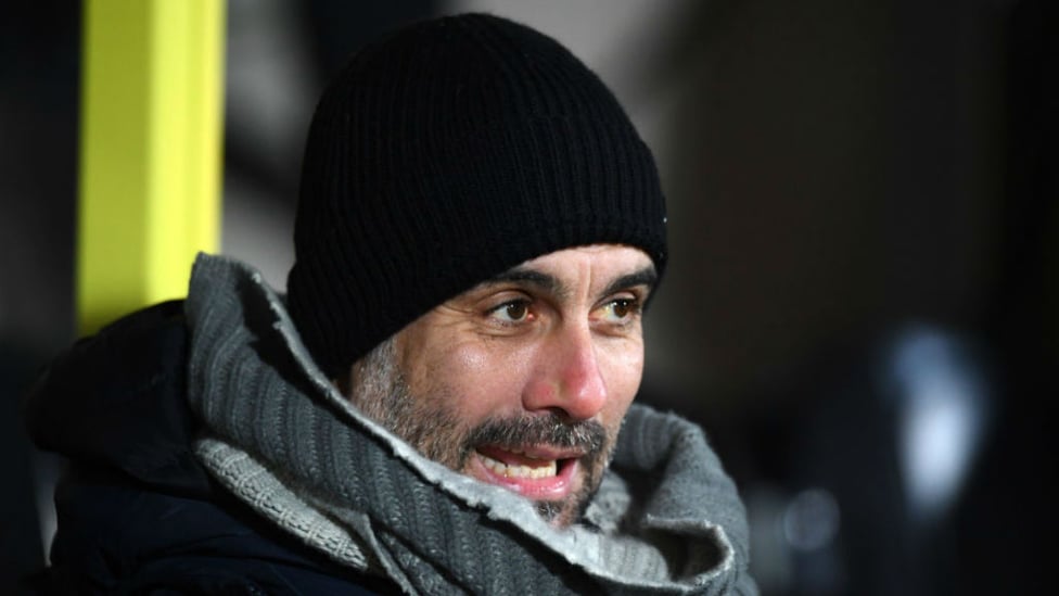 KEEPING WARM : Pep wraps up on a chilly night at the Pirelli Stadium