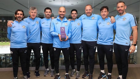 PL AWARD: Pep and his staff with the Barclay's Manager of the Month award