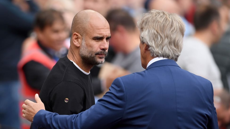 PAST AND PRESENT : Pep Guardiola and Manuel Pellegrini shake hands on the touchline.