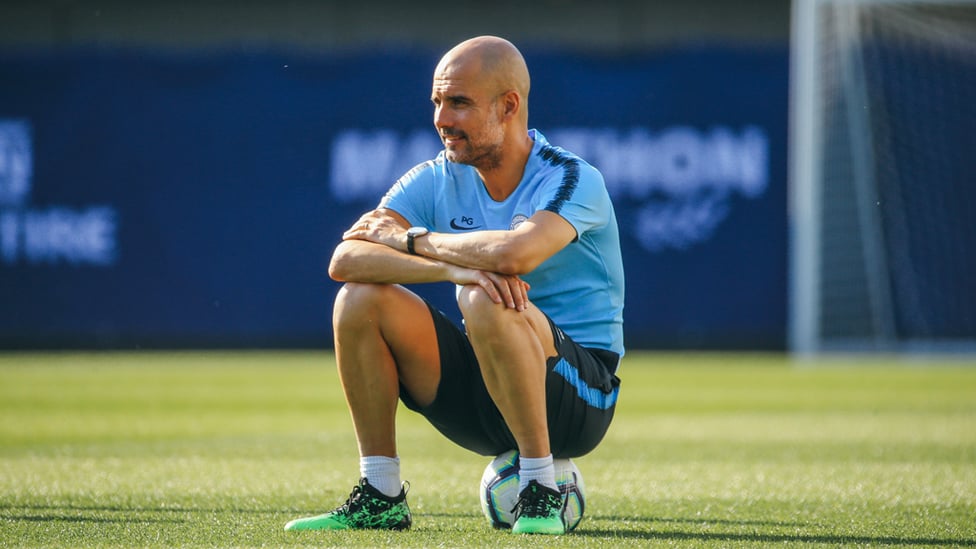 BEST SEAT IN THE HOUSE : Pep Guardiola, on the ball!