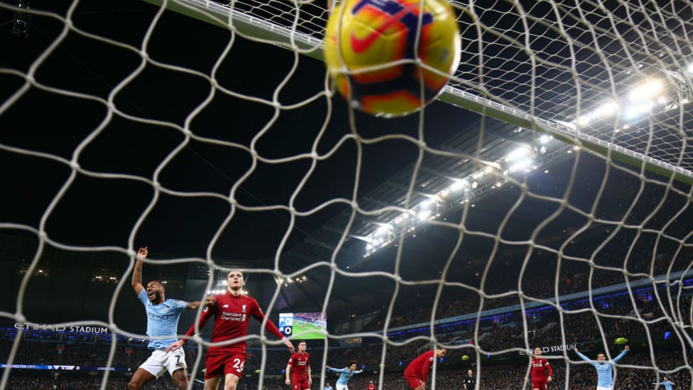 NET GAIN : The ball nestles in the back of the Liverpool goal after Sergio Aguero's wonder goal