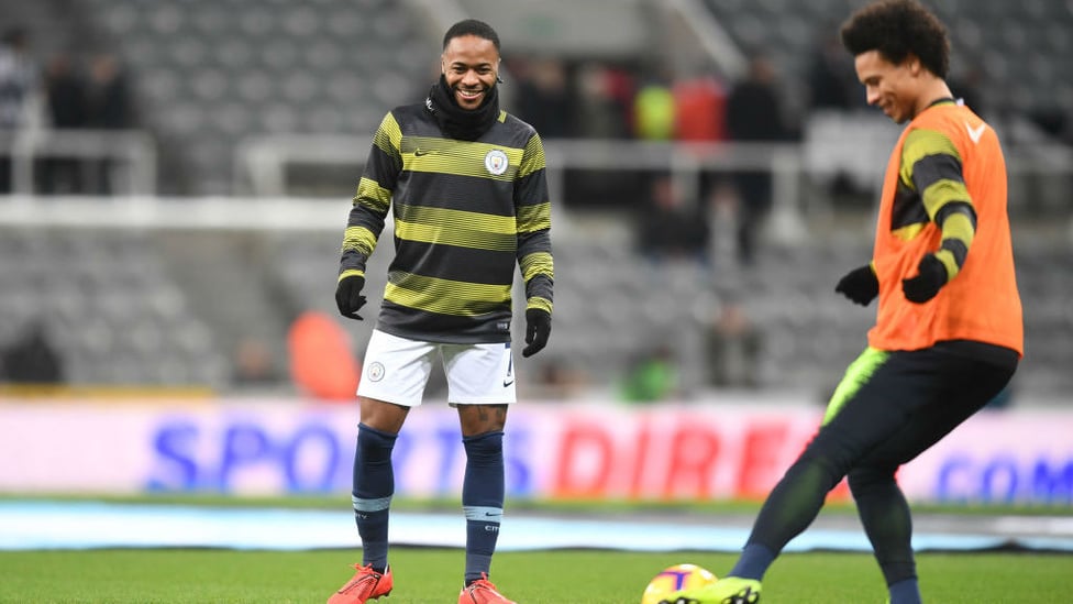 WARMING UP : Raheem Sterling and Leroy Sane prepare for the game