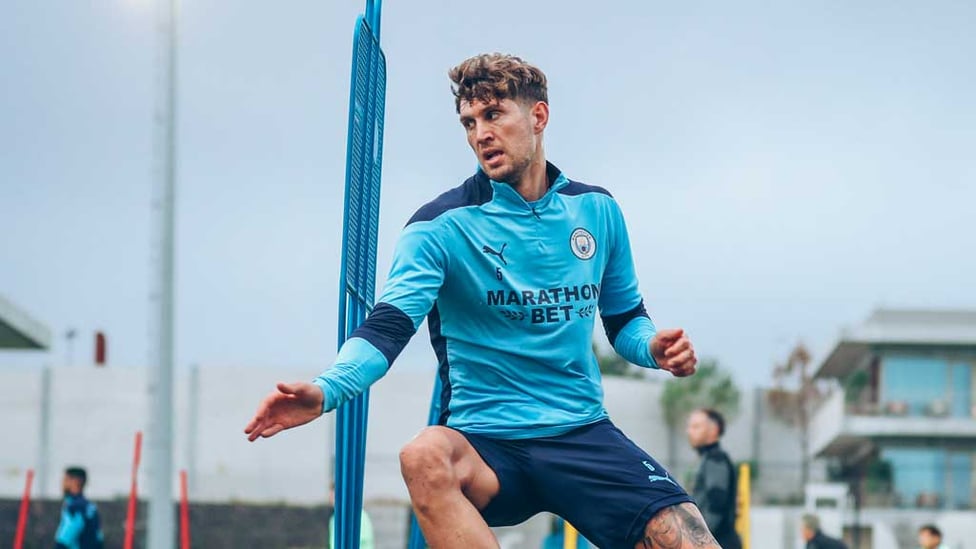 SHARP TURN : John Stones putting the hard yards in.