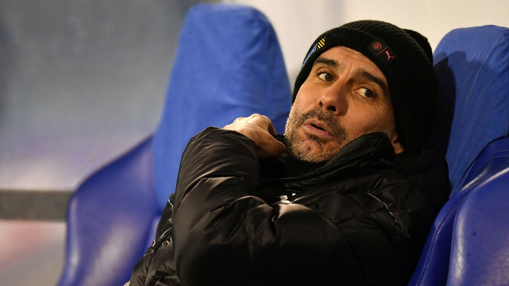 WRAPPED UP: The boss in chilly conditions pre-match.