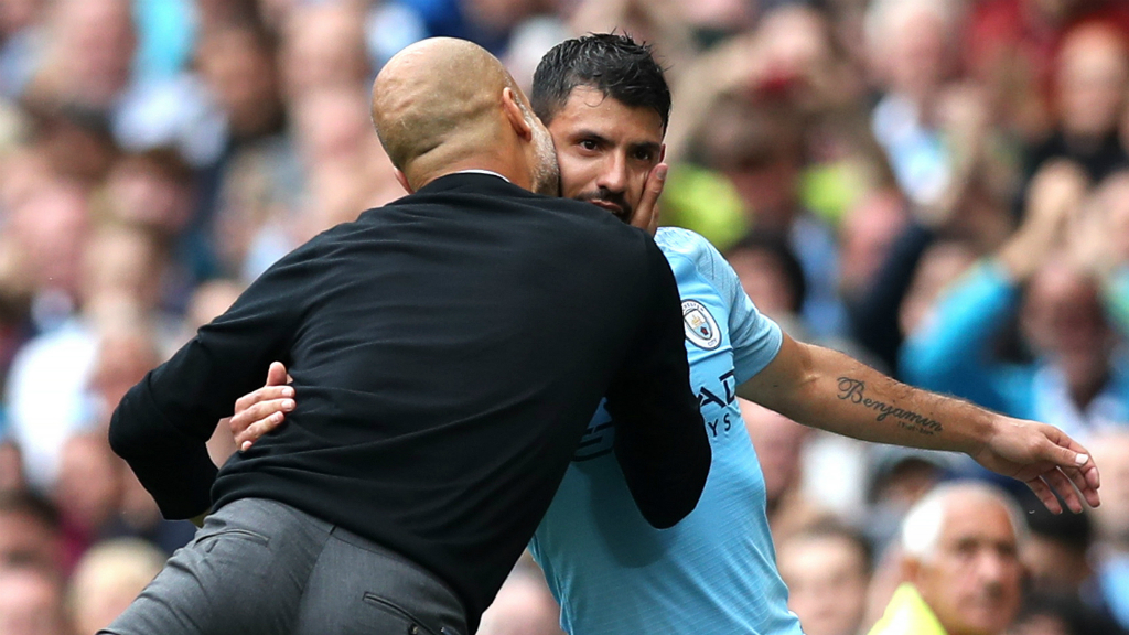 MAN OF THE MATCH : Pep Guardiola shows his appreciation for his hat-trick hero