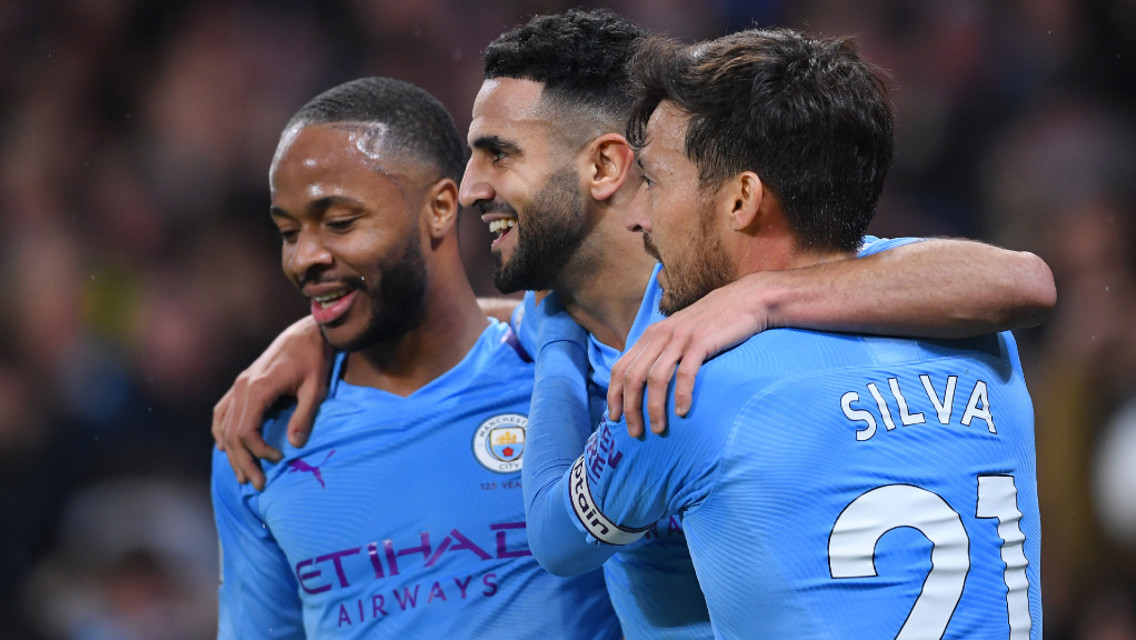 TRIO-MENDOUS: Raheem Sterling and David Silva congratulate Riyad Mahrez on his super strike