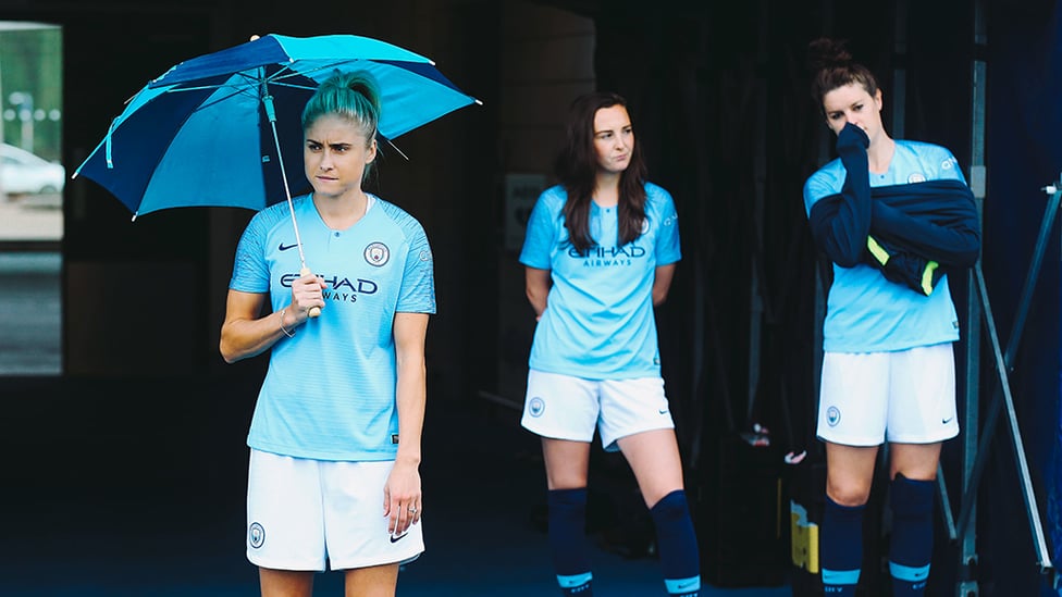 SKIPPER : Steph Houghton stays out of the rain.