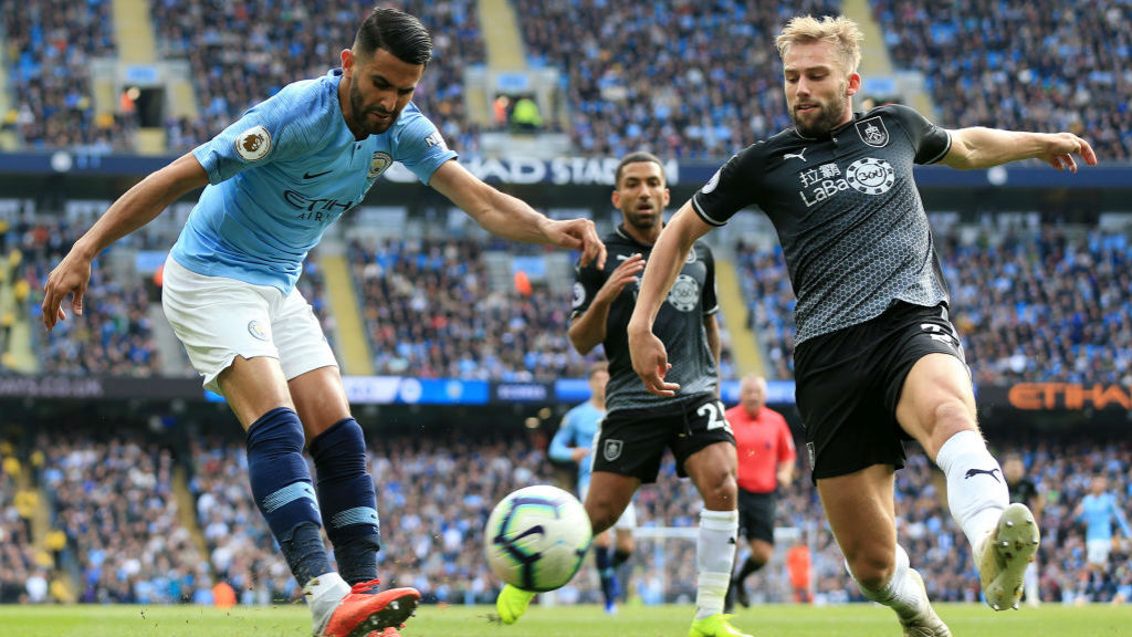 INGING IN : Riyad Mahrez whips over a cross from the right flank