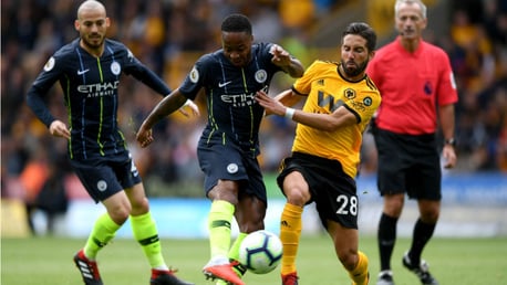 BY THE RIGHT: Raheem Sterling fizzes in a shot on the Wolves goal but is denied by Patricio's wonder save