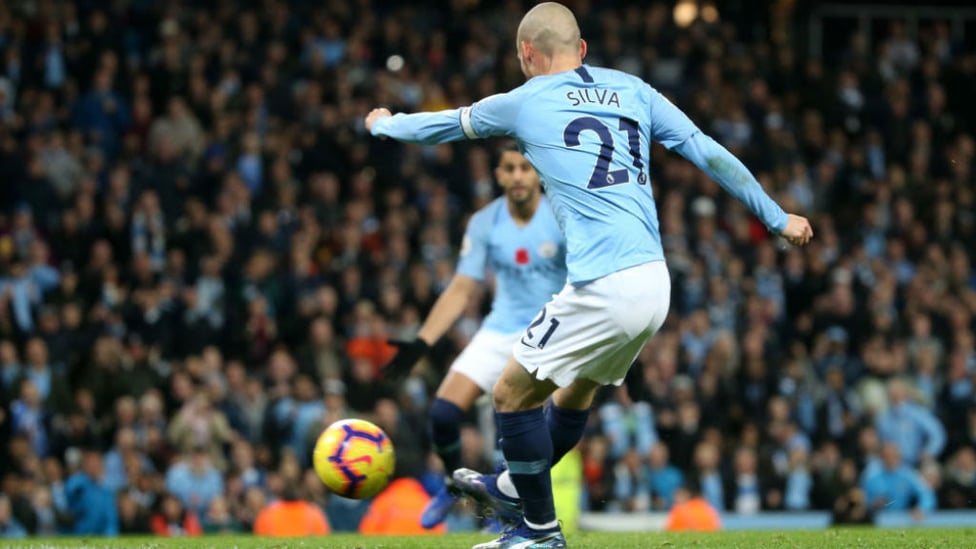 BY THE RIGHT : David Silva slams home City's first goal