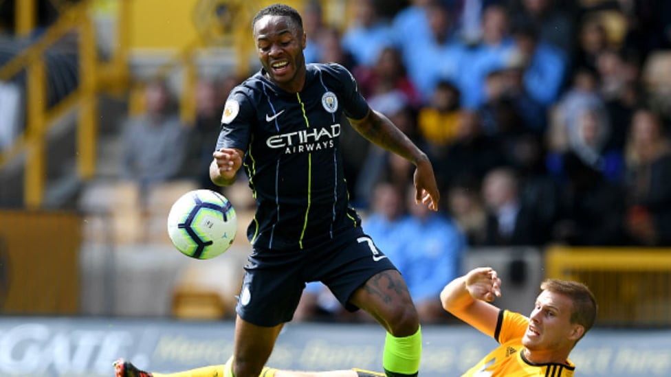 TOUGH TEST : Raheem Sterling evades the attentions of Ryan Bennett as City battle to a 1-1 draw at Molineux