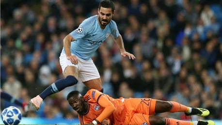 G FORCE: Ilkay Gundogan looks to power through the Lyon defence