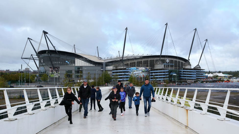 CALM BEFORE THE STORM : Dull clouds loom above the Etihad Stadium ahead of kick off