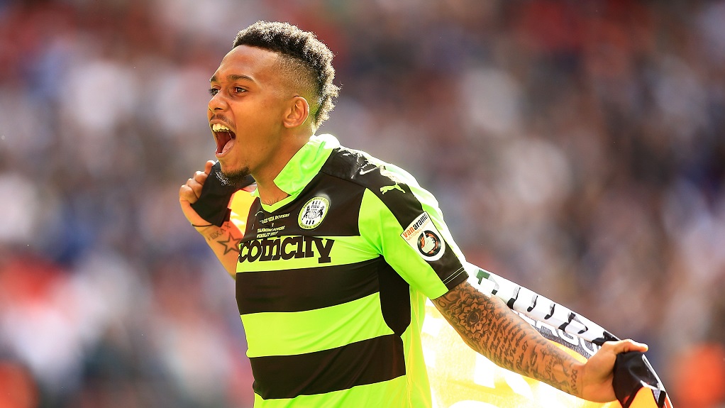 Keanu celebrates a Wembley play-off win with Forest Green