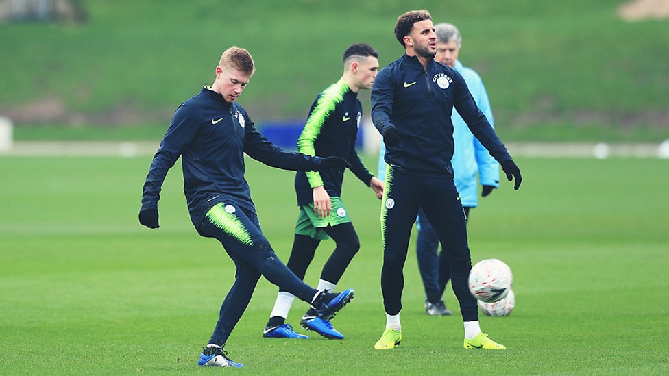 PASS MASTER : KDB limbers up with some passing practice