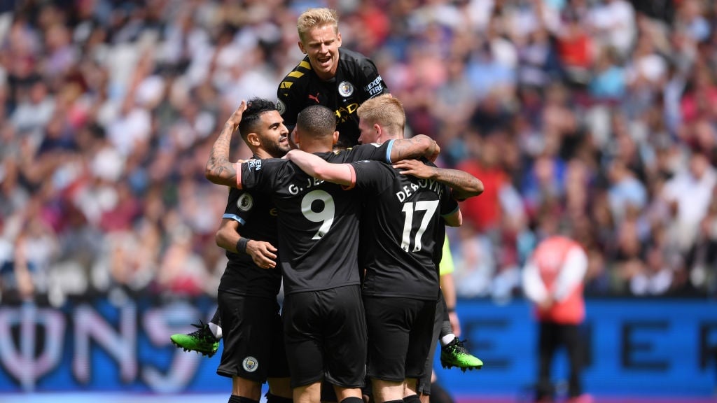 DOUBLE DELIGHT: City celebrate Raheem Sterling's second-half strike.