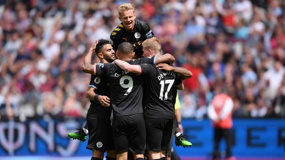 DOUBLE DELIGHT : City celebrate Raheem Sterling's second-half strike.