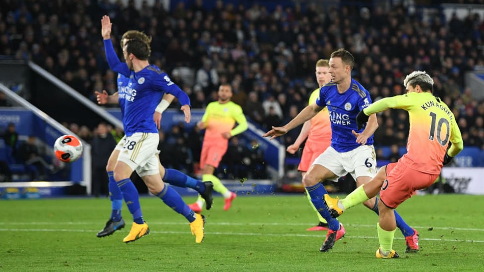 ALL FIRED UP: Sergio Aguero powers in a shot on the Leicester goal