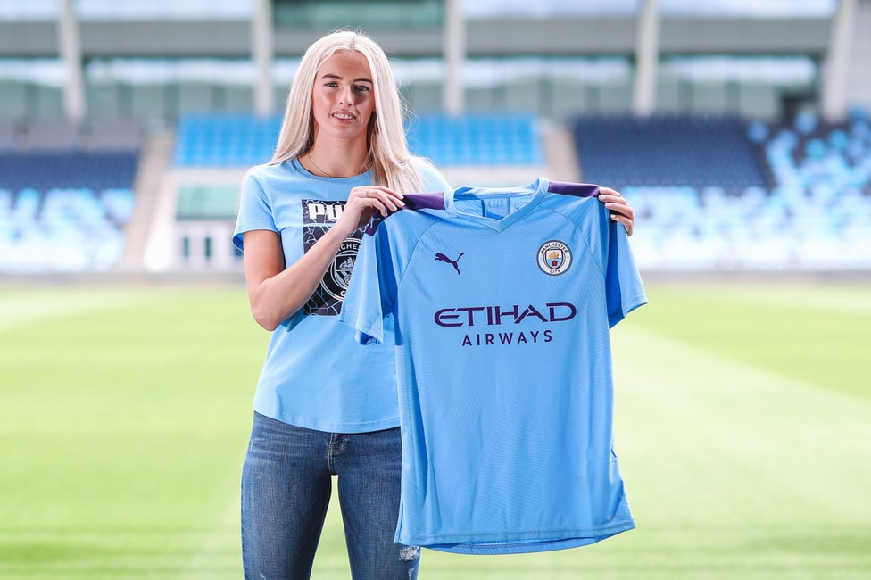 SHOWING HER BLUE COLOURS : The famous shirt shot