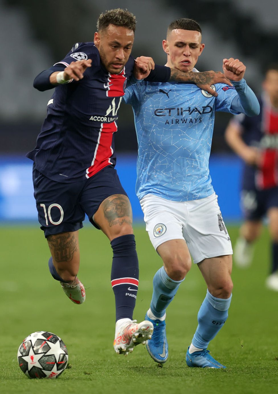 MIDFIELD BATTLE: Phil Foden and Neymar tussle for possession