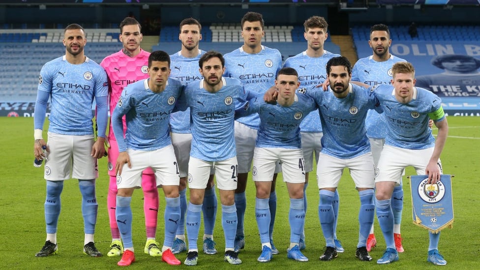 SQUAD GOALS : The starting team pose for a photo ahead of kick-off.