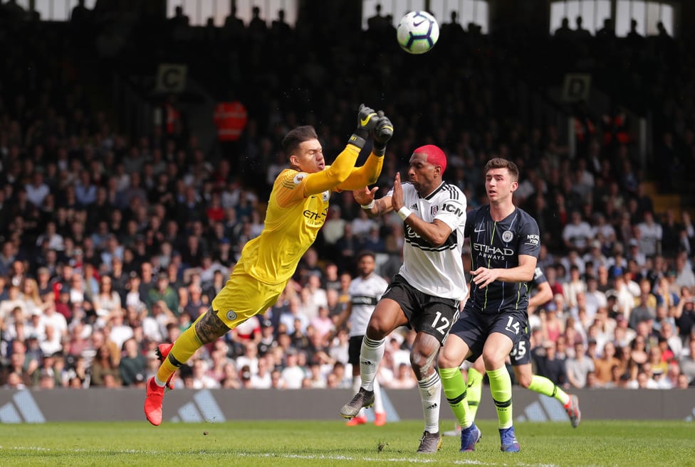 UP AND AWAY : Ederson punches clear