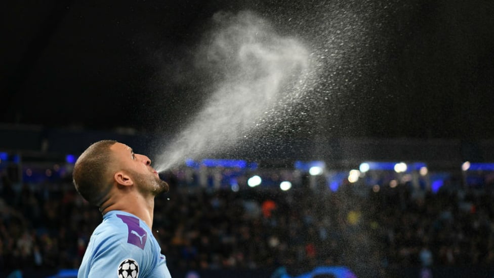 WATER BREAK : Walker prepares for the game in his inimitable way