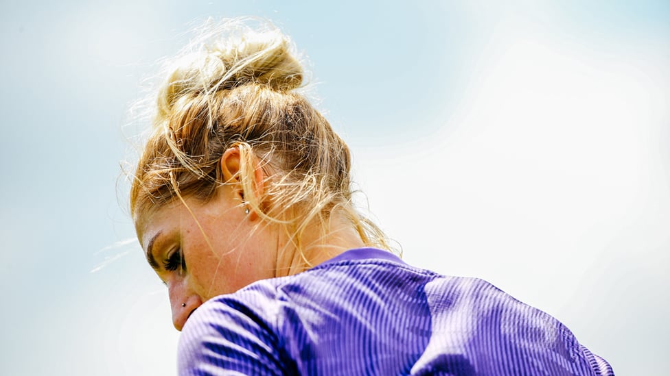 HAIR WE GO : Laura Coombs takes a quick breather during Monday's session