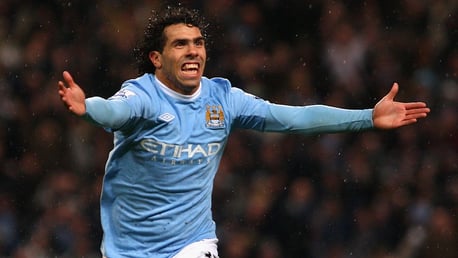 ON TARGET: Carlos Tevez celebrates his winner against Chelsea in 2009.