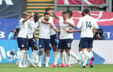 The City team congratulate Sergio Aguero on his super strike