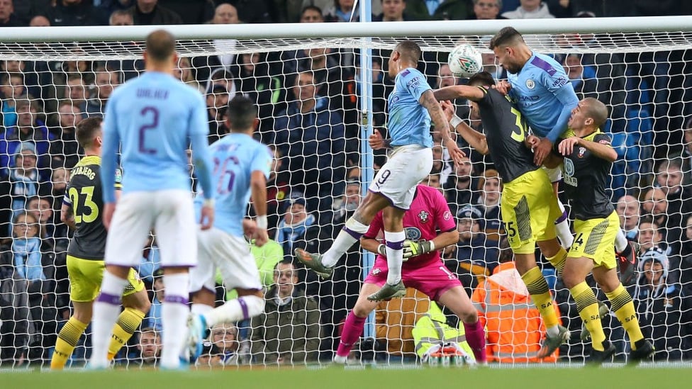 NO STOPPING HIM : Nicolas Otamendi rises highest to power home the opening goal.