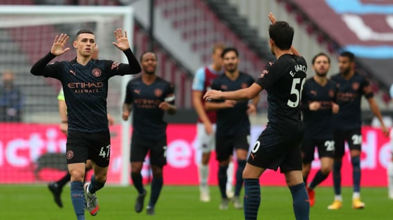 BACK IN THE GAME: Phil Foden celebrates with Eric Garcia