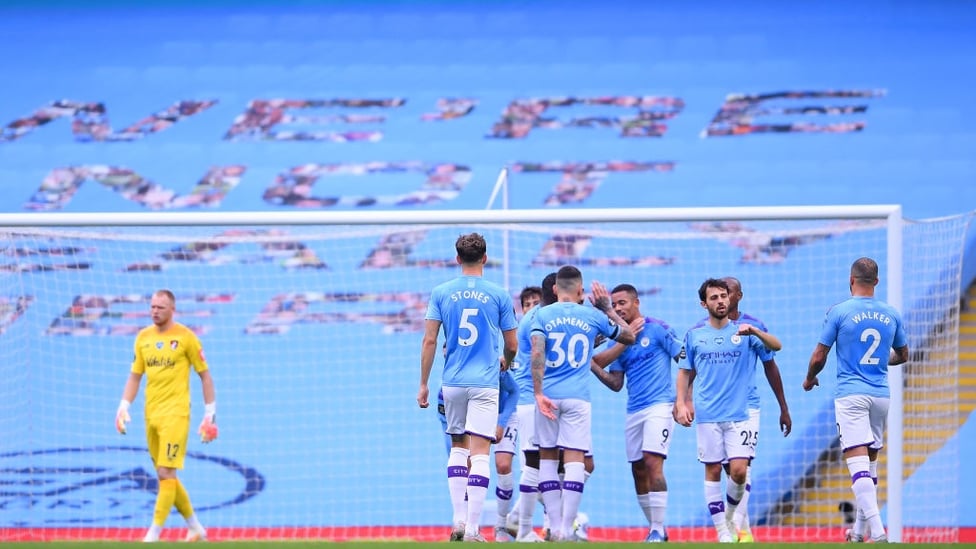 DEJA VU : The players gather to celebrate again after Jesus' impressive strike.