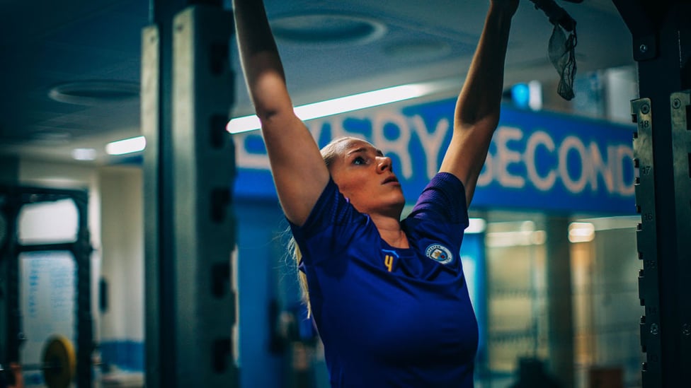 REACH FOR THE SKY : Gemma Bonner tests her upper body strength