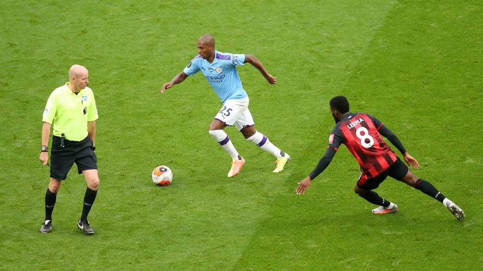 BOSSING THINGS : Fernandinho keeps things ticking over for City in the second period.